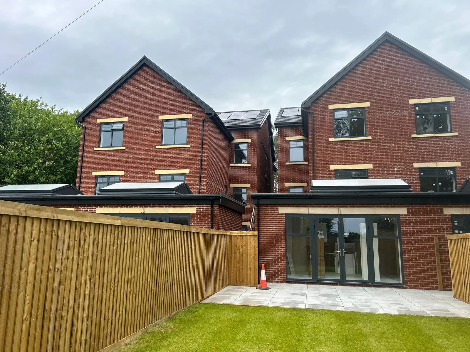 Two-storey side extension with matching brickwork in Urmston